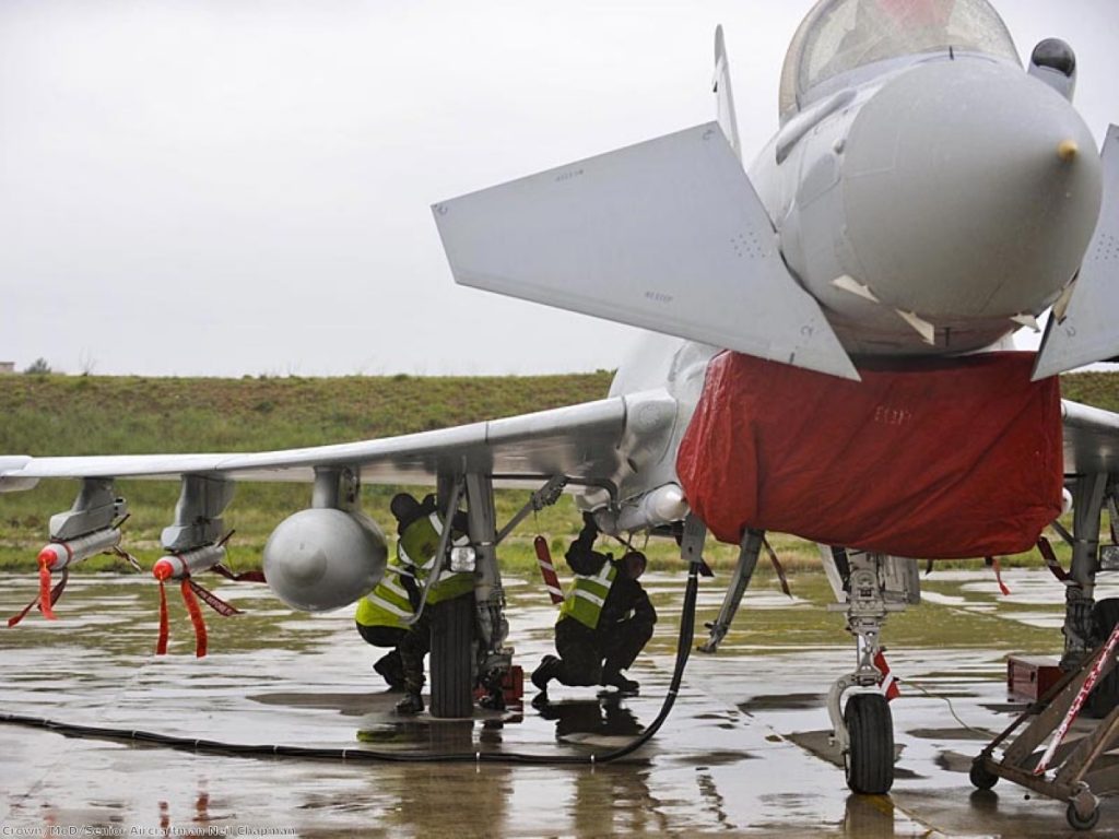 RAF ground crew prepare a Typhoon for action over Libya