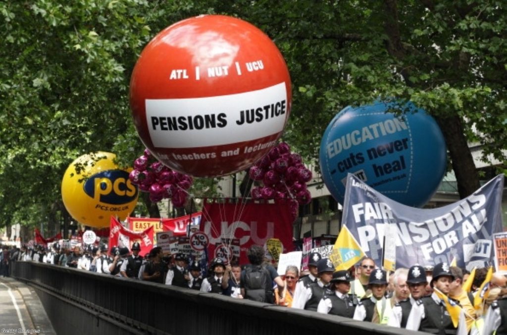 Demonstrators speak out as they march in Westminster. Photo: Getty Images