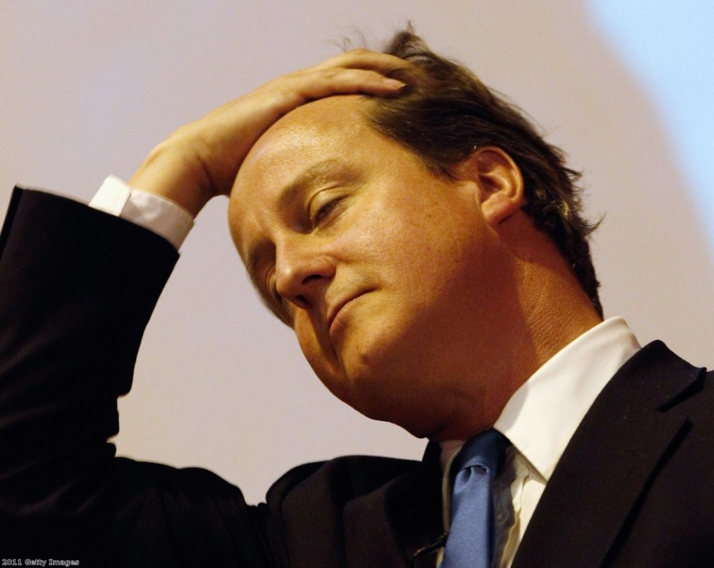 Under pressure: The phone-hacking scandal is threatening Cameron