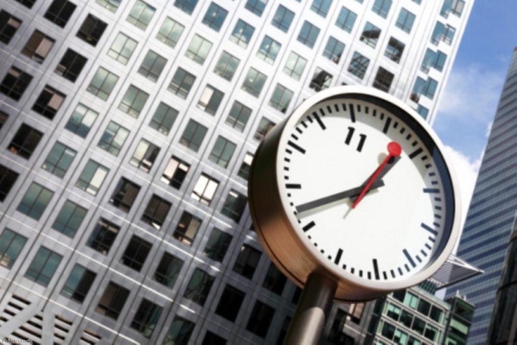 Time for reform? A clock watches over Canary Wharf, where the banking sector has been on overdrive in recent weeks.