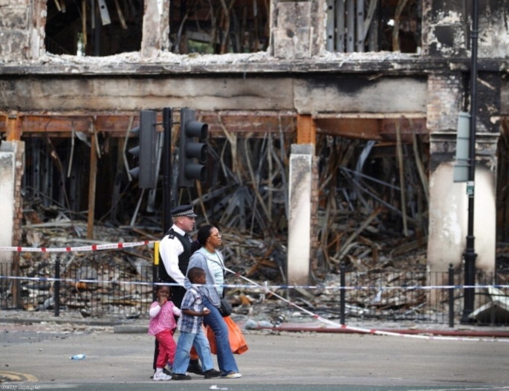 Police continue the rebuilding work after August's riots