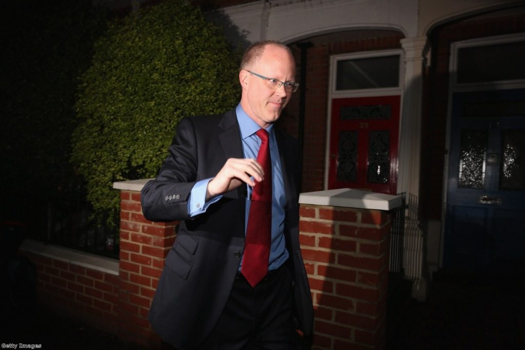 BBC director general George Entwistle leaves his home this morning with a press pack outside his front door. 