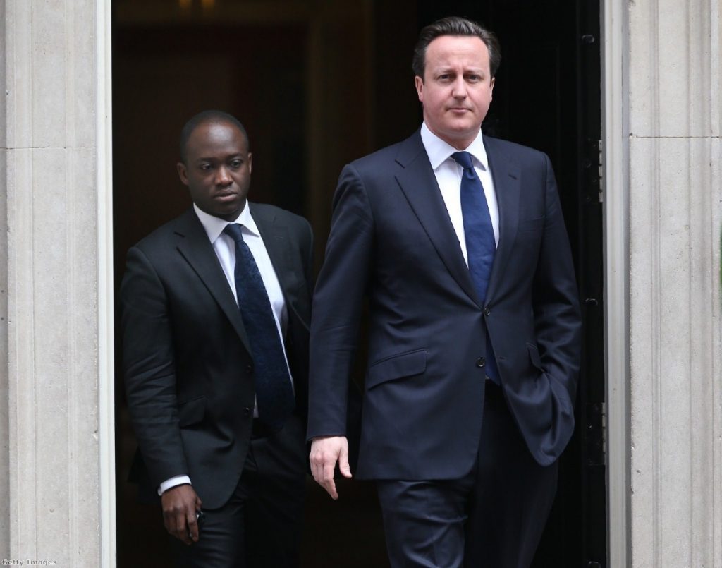 David Cameron leaves Downing Street with his private secretary Sam Gyimah as parliament is called back from recess. 