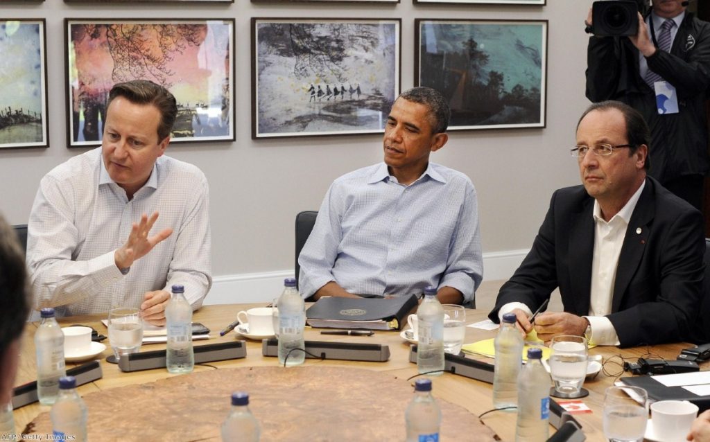 World leaders were told to dress casual and placed at a small table which advisers could not fit around at the G8  