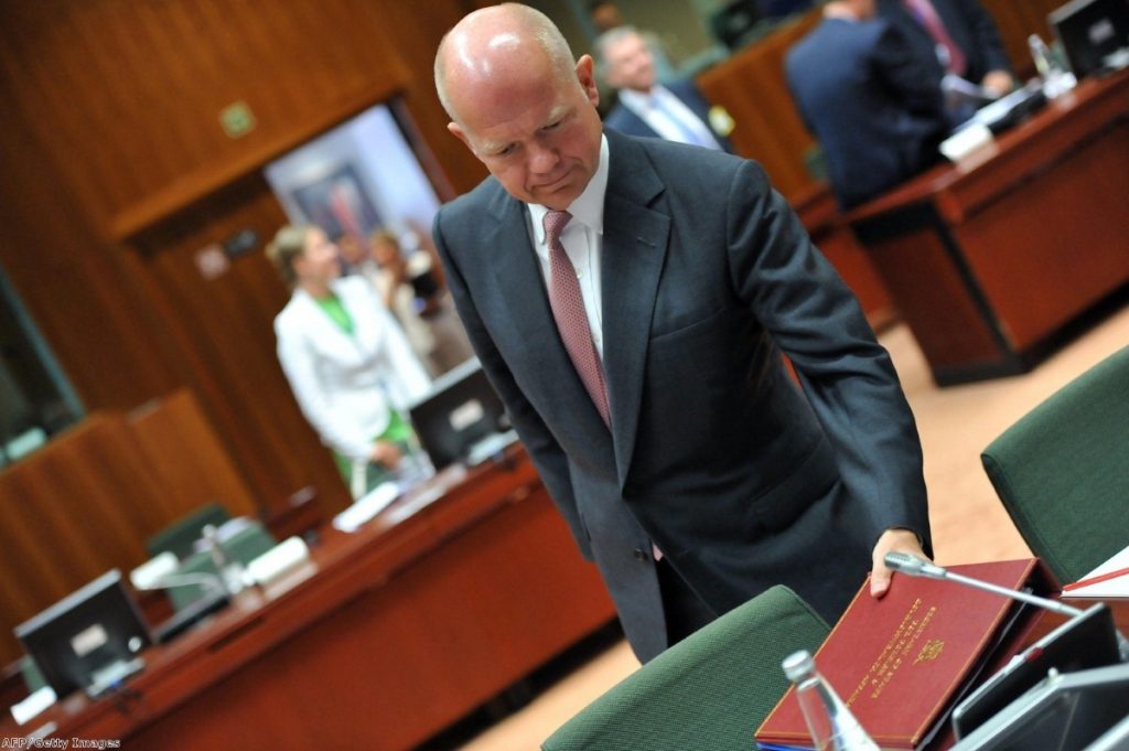 William Hague arrives at a foreign ministers' meeting on Egypt in Europe yesterday. As he attended, the Council of Europe launched a withering attack on Britain's detention of David Miranda.