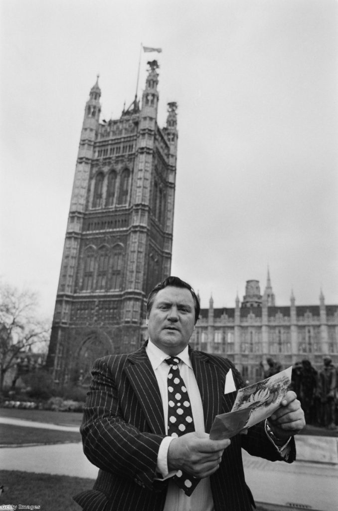 Dickens outside parliament just after he used parliamentary privilege to name British diplomat Peter Hayman as a paedophile