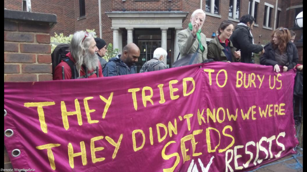 Campaigners from the Sweets Way Resists group outside court