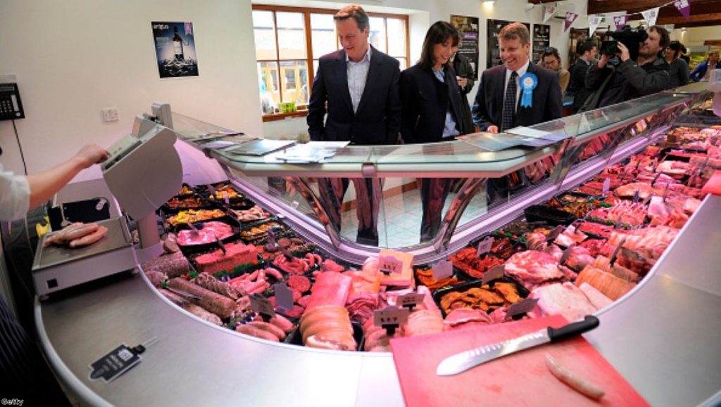 David Cameron admiring some meat products on the campaign trail 