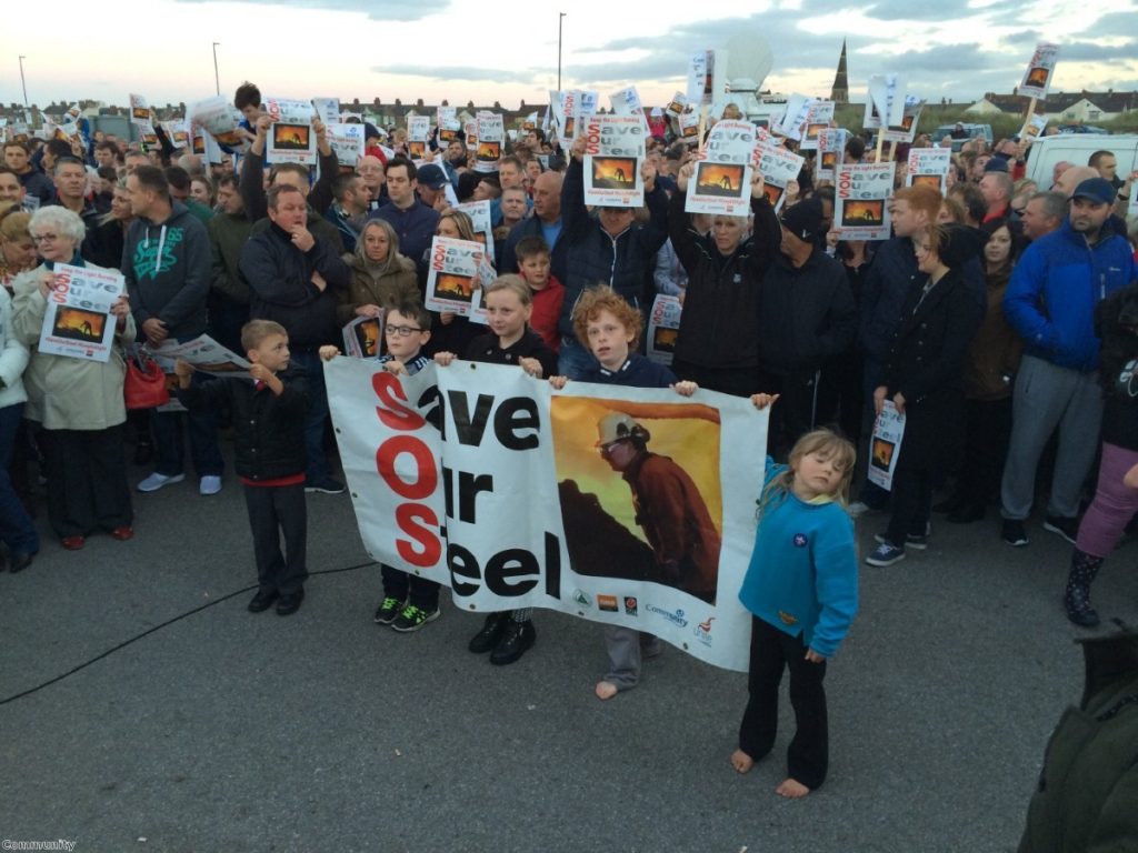 Workers hold a rally to save the British steel industry