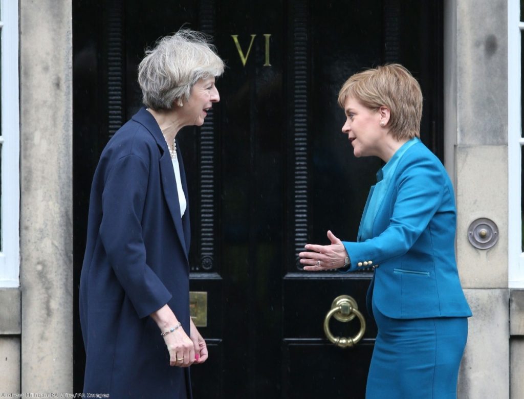 Theresa May is greeted by Scotland