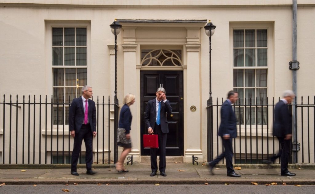 Stephen Barclay, Liz Truss, Mel Stride and Andrew Jones leave Philip Hammond with his red box outside 11 Downing Street this morning. 