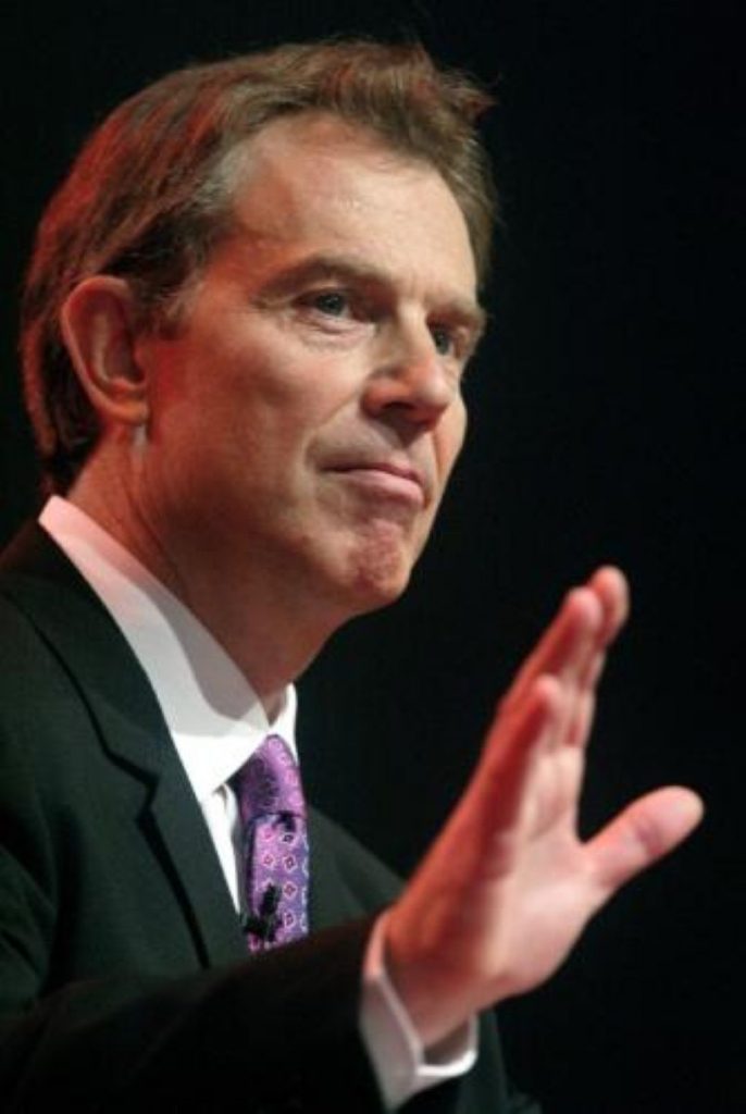 Blair defends ID cards