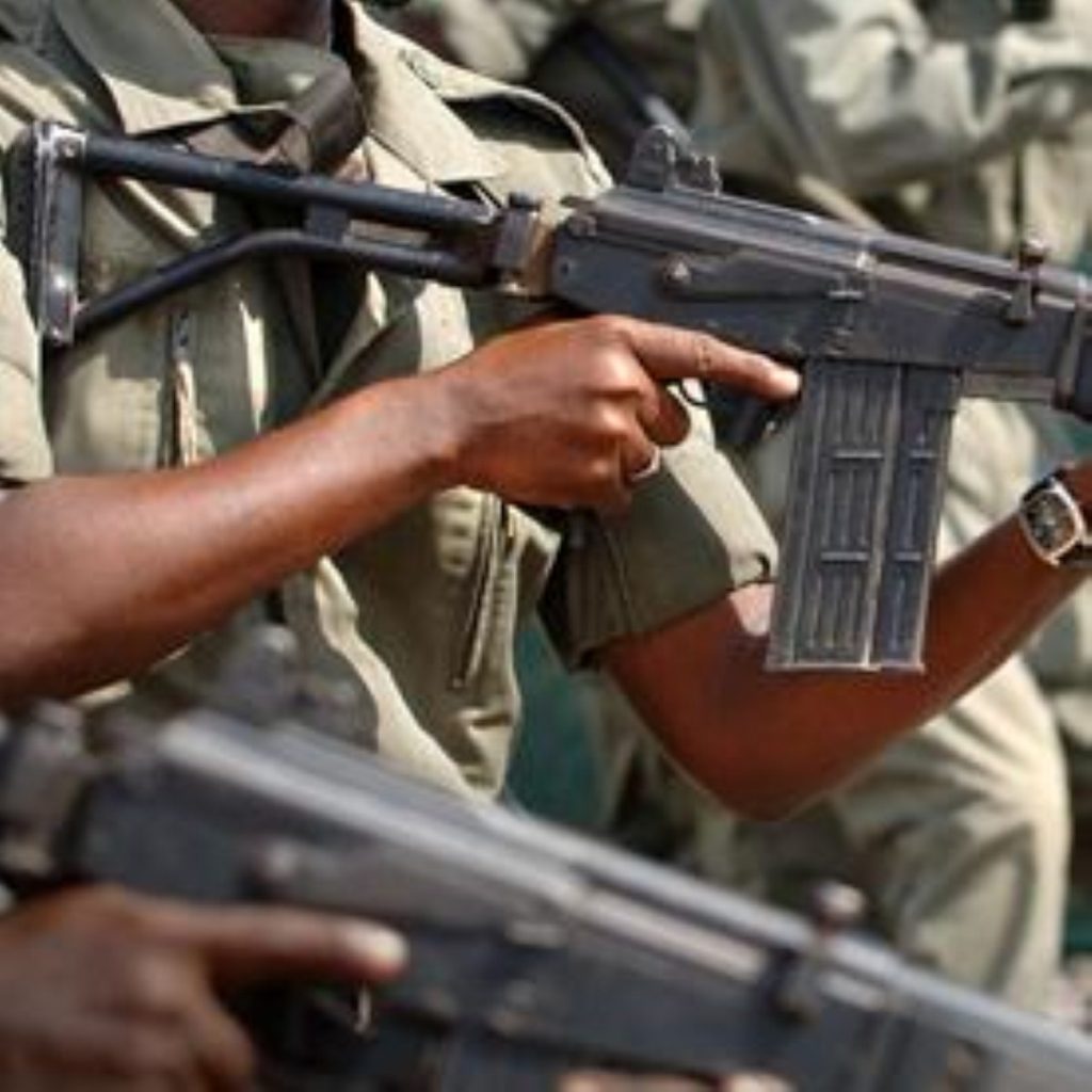 Armed police in Nigeria. Some parts of the country stone gay people to death.