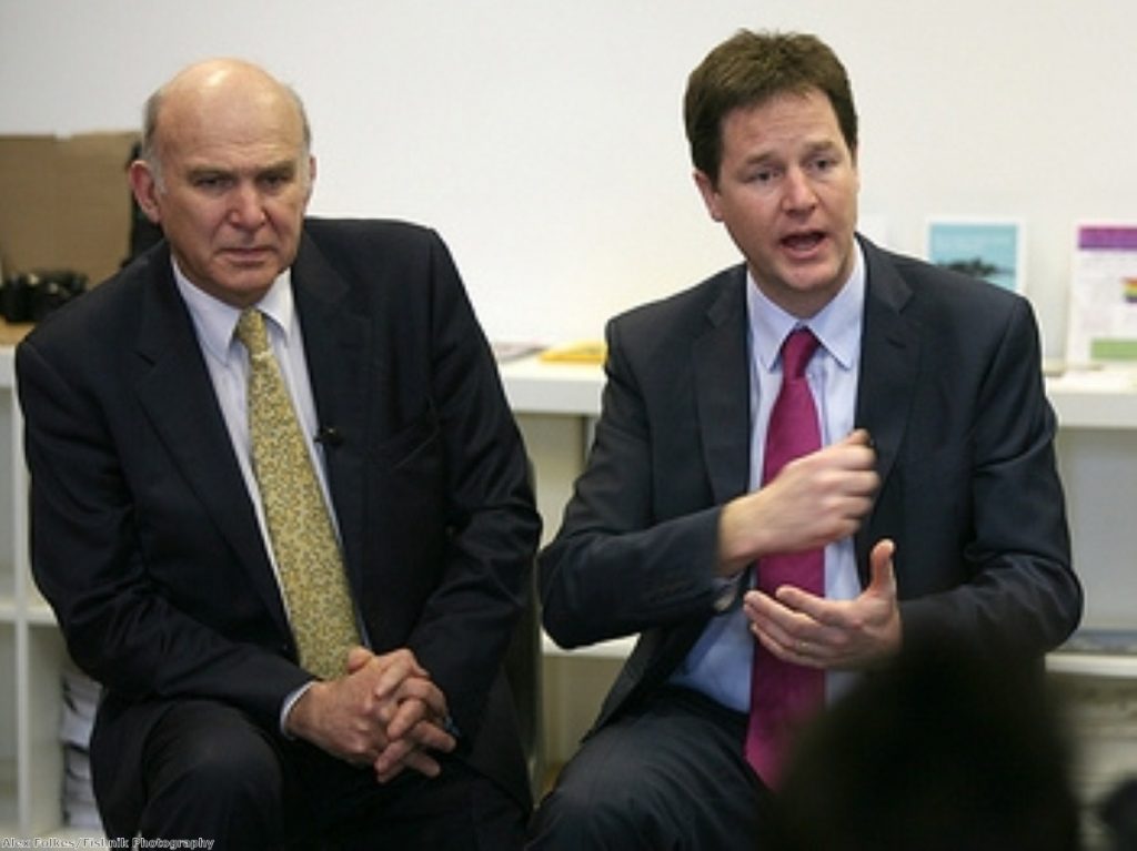 Cable (left) has made clear he is not entirely comfortable in Cameron and Clegg