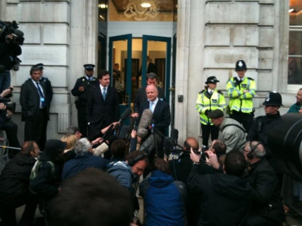 Tory leaders leave the Cabinet Office during coalition negotiations