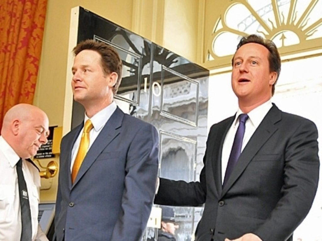 Clegg and Cameron walk into Number 10 together