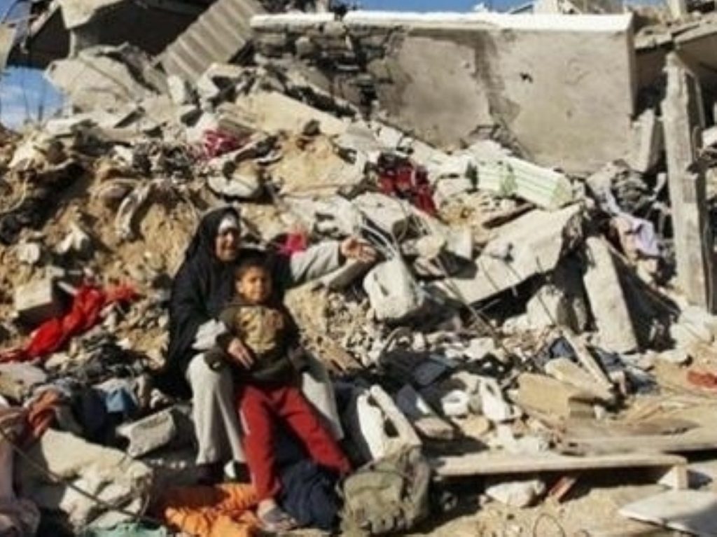 Rubble meets Gazans following an Iasraeli bom bing raid. The import of construction materials had previously been banned as part of the blockade, meaning many residents could not rebuild their homes.