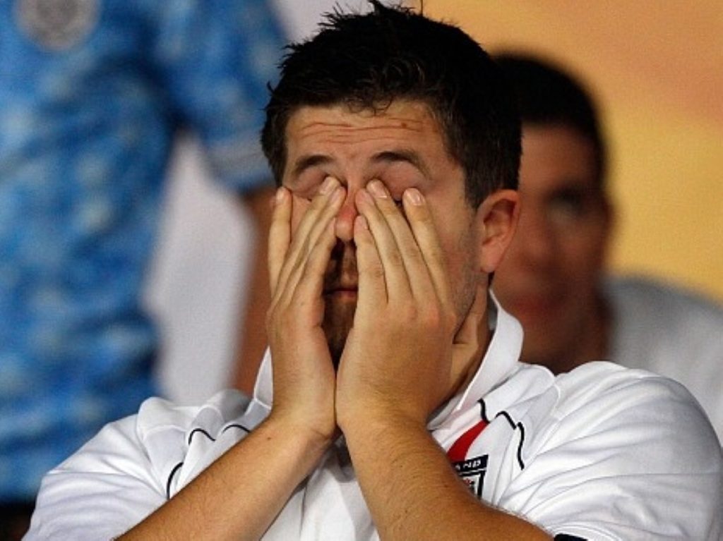 A dejected England fan during the last World Cup.Hearts were broken again yesterday when the nation lost the chance to host the event.