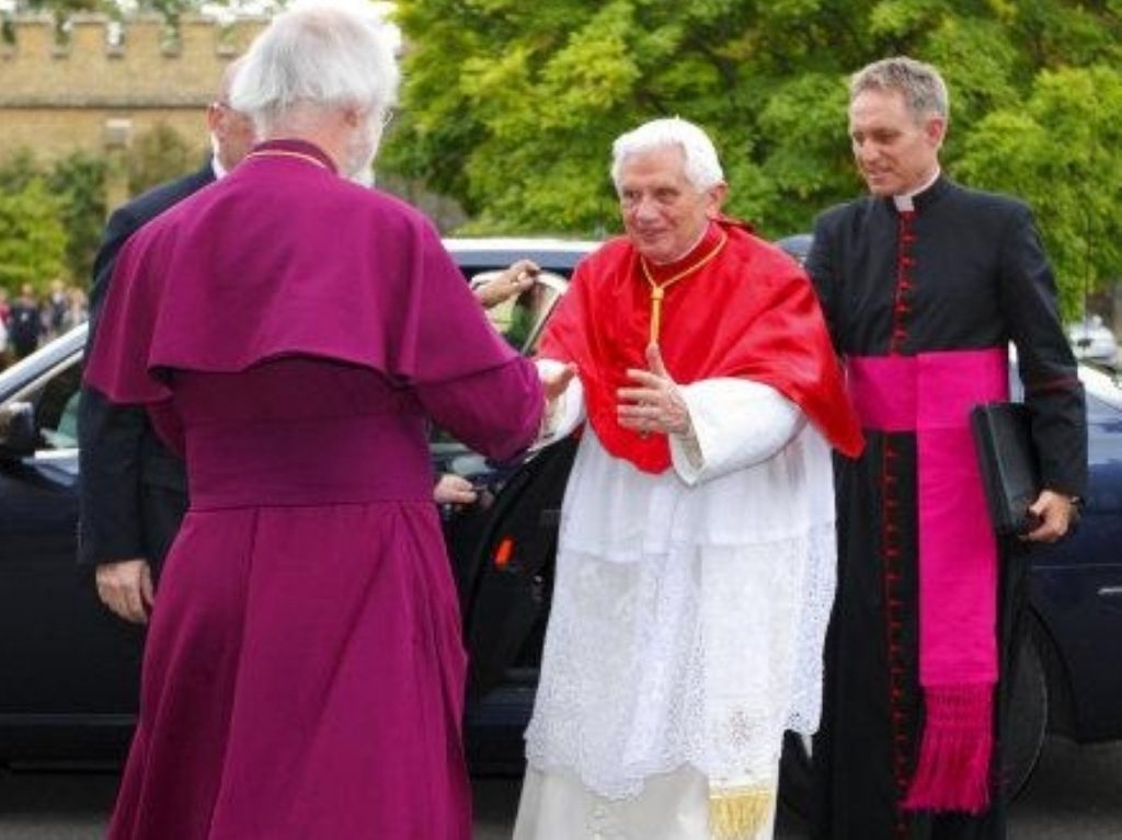 Archbishop of Canterbury greets the Pope during last year's visit