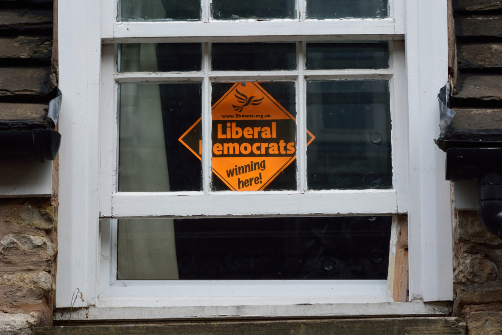 A Liberal Democrat sign in a window