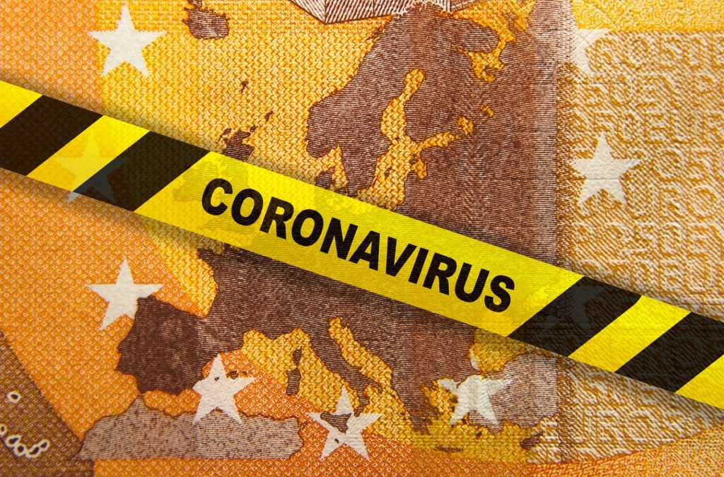 Coronavirus quarantine in Europe. Concept. 50 Euro banknote with EU map and yellow tape.